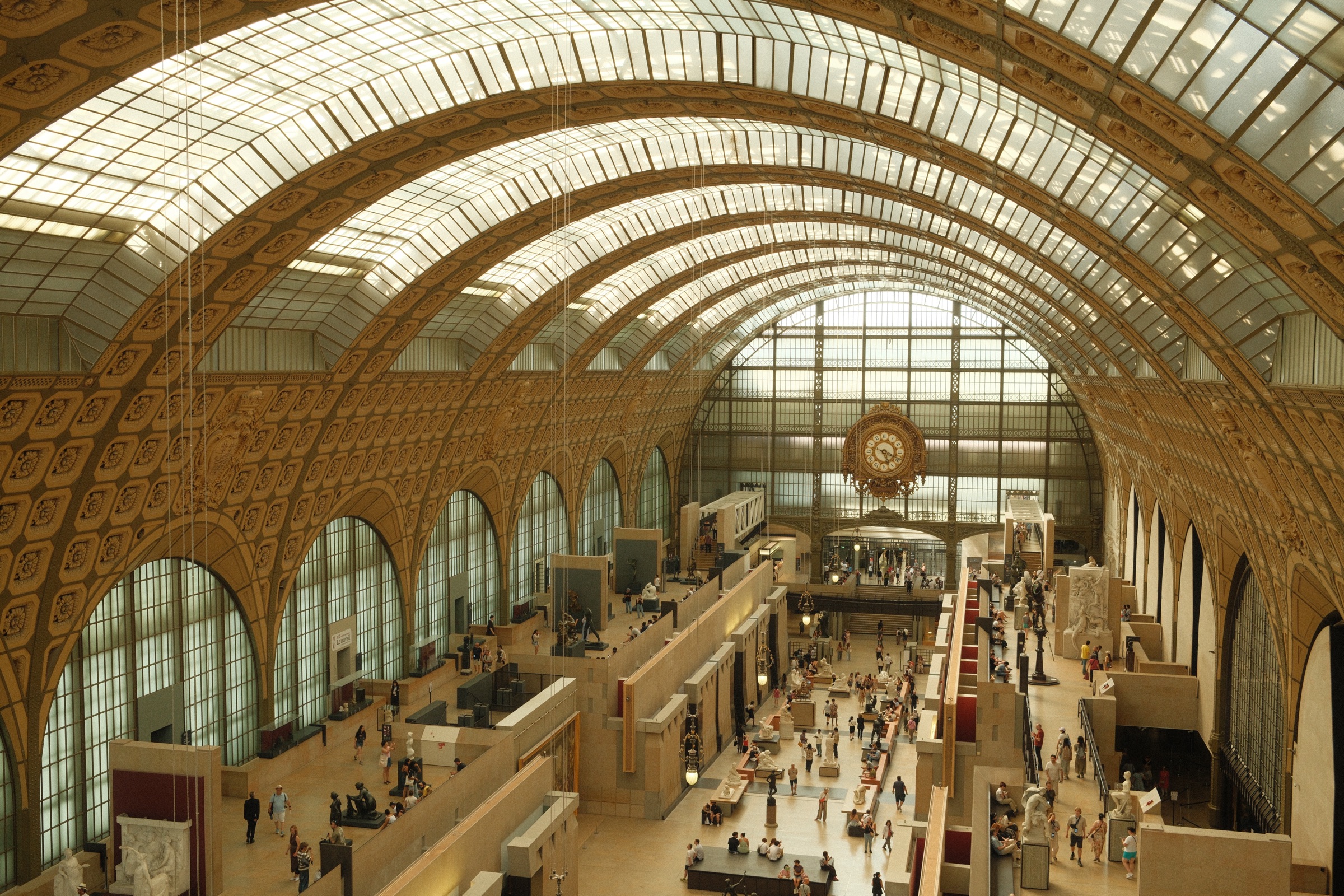 The great hall of the Musée d’Orsay under its arched glass roof