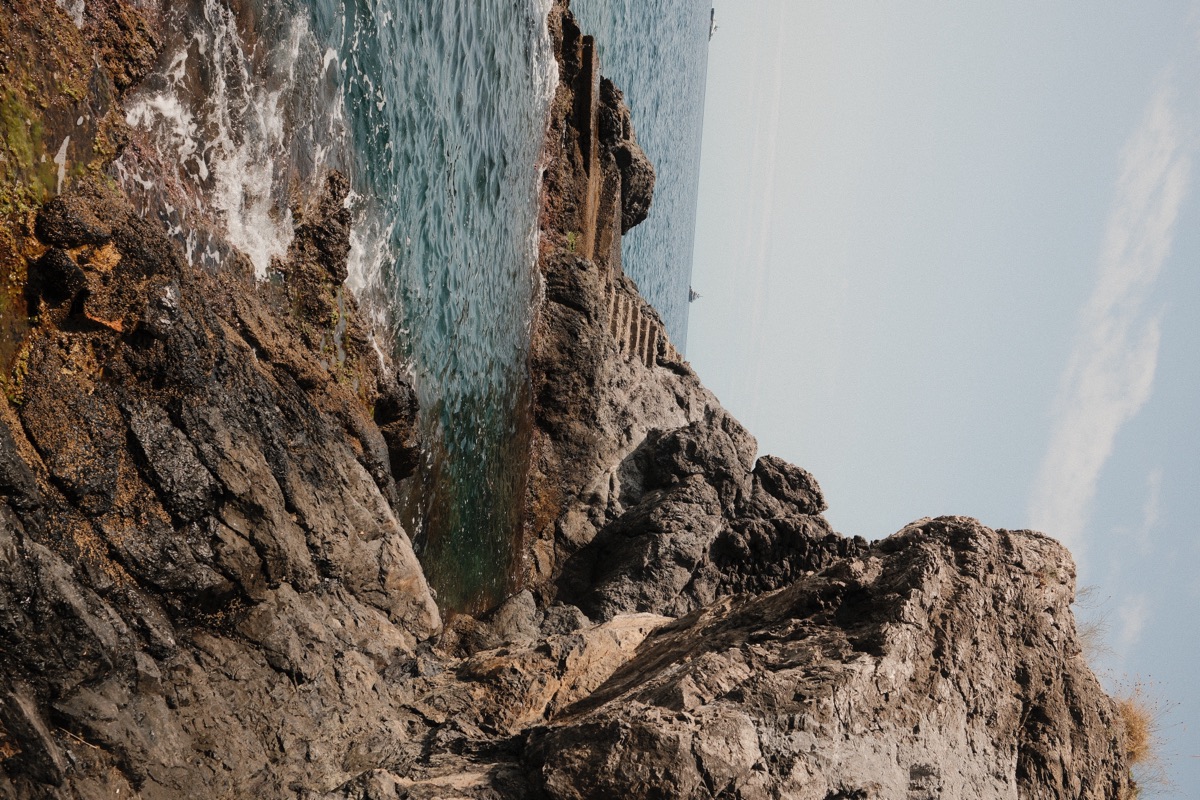 Waves breaking against a rocky headland